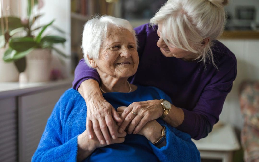 A woman helping her elderly loved one find a home for dementia patients